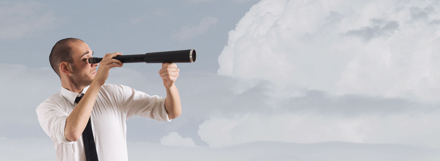 person looking out a telescope to clouds